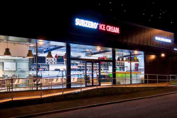 Illuminated parlour front at night